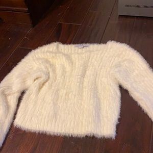 white fuzzy sweater